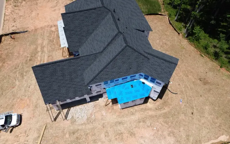 Best Atlanta Roofer team performing a free roof inspection on a residential home in Atlanta, GA